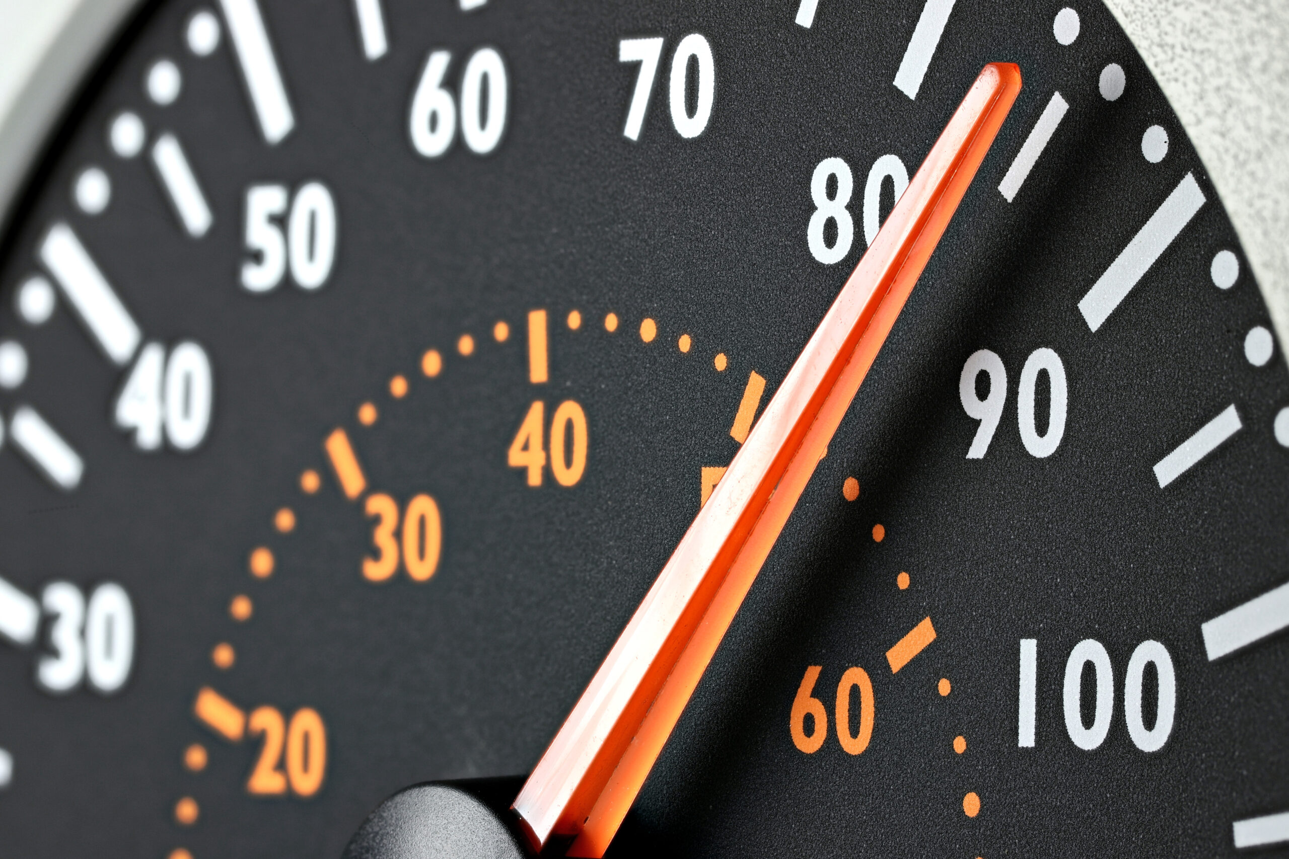 Close-up of car speedometer.