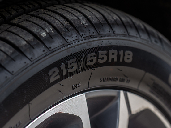 Closeup of the numbers on the sidewall of the tire, indicating the tire size.